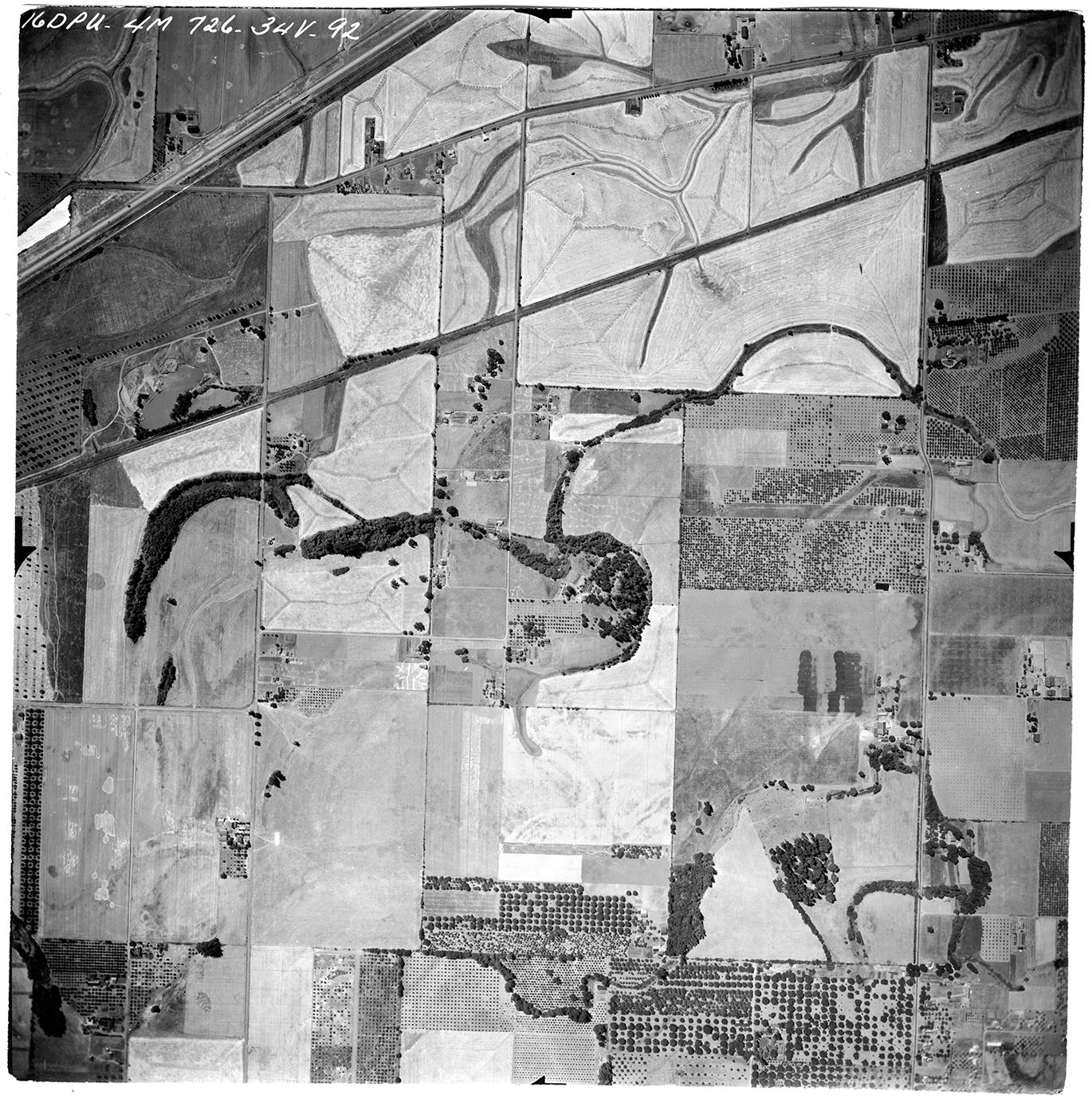 Aerial photograph from 4m726 N.W. River Survey, frame 34V-92.